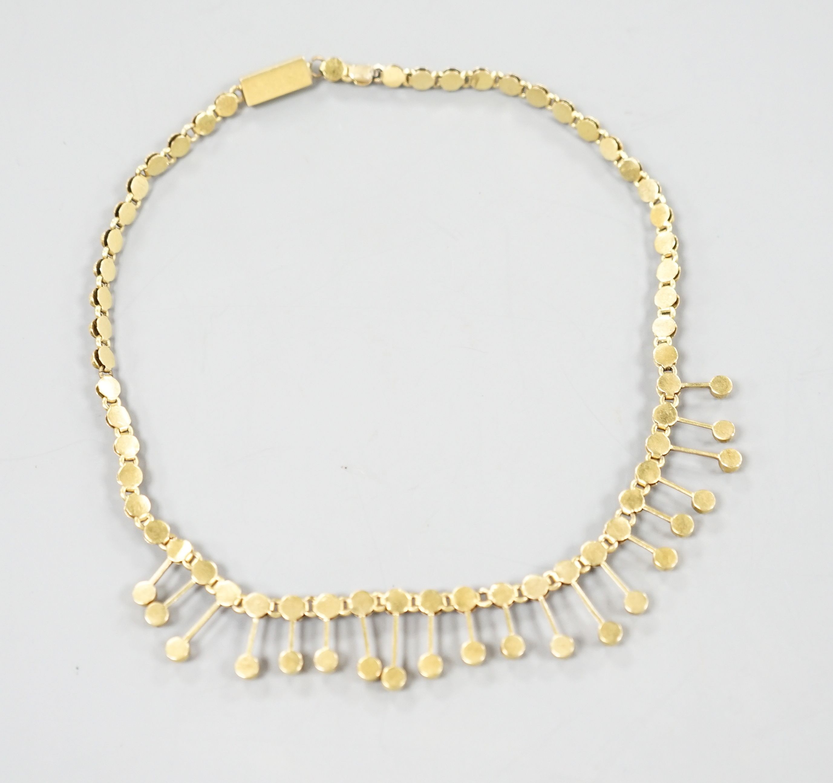 A late Victorian yellow metal and seed pearl set fringe choker necklace, 33cm, gross 18.4 grams.